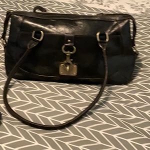 vintage Etteinne Aiger in leather all original hardware.